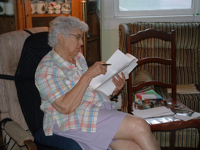 Aunt Martha reading and deciding