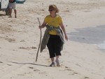 Betty Douglas well known explorer on beach at Baker's Bay on Great Guana Cay