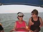 Minta Fannon explaining finer points of steering to "Miss Cathy" (Cathy Williams)