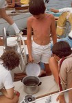 Kids checking the crab pot..