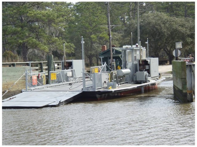 Bridges have replaced most of the ferries, but this small fellow still runs carrying cars from on side of the ICW to the other south of Gerogetown, SC.  He did not seem very busy.