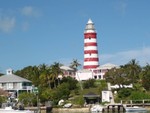 Hope Town Lighthouse, keeper's cottage, 120 ft high, built 1863, five lenses, 325,000 candle power.