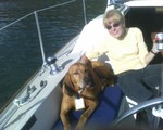 "Need a bigger boat or smaller dog.."
Sandra with Tyrus on Little's O'Day 272