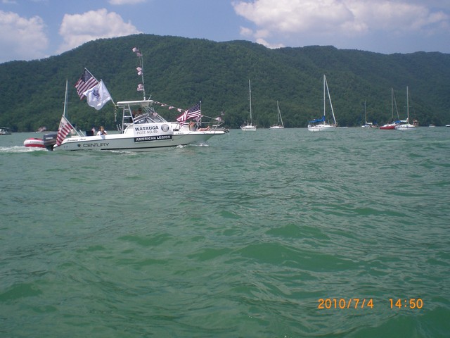 Boat parade with sailboat spectators. (pics from C. Lucas)