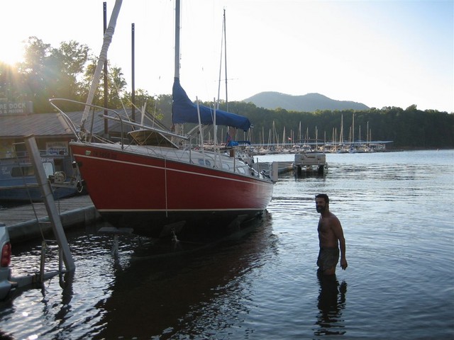 Jeff Arnfield watches as Windward pulled from lake