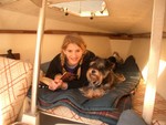 Becca, Bryson's daughter, and dog Reese taking it easy down below in Merit 22