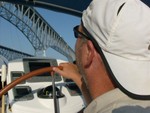 Dave contemplating sailing between spans of Chesapeake Bay Bridge