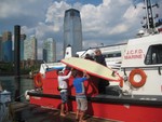 Fire ferry carrying boards back from NYC to Jersey after 2008 Sea Paddle NYC event