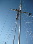 Do you hear me now??  Cell phone problems even at sea..(Bill Murdoch on mast of Irish Eyes in South Creek)