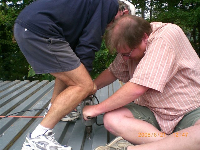 Sat July 21, 2008, screwing down the subdeck..
(Picture submitted by C. Lucas)
