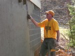 Putting stucco on block wall, Dec 27 (Picture by C. Lucas)