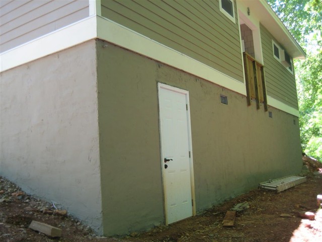 two coats stucco completed and painted (May 9, 2009)