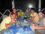 satisfied sailors at Foxy's Taboo, Jost Van Dyke, restaurant supplied insect spray!